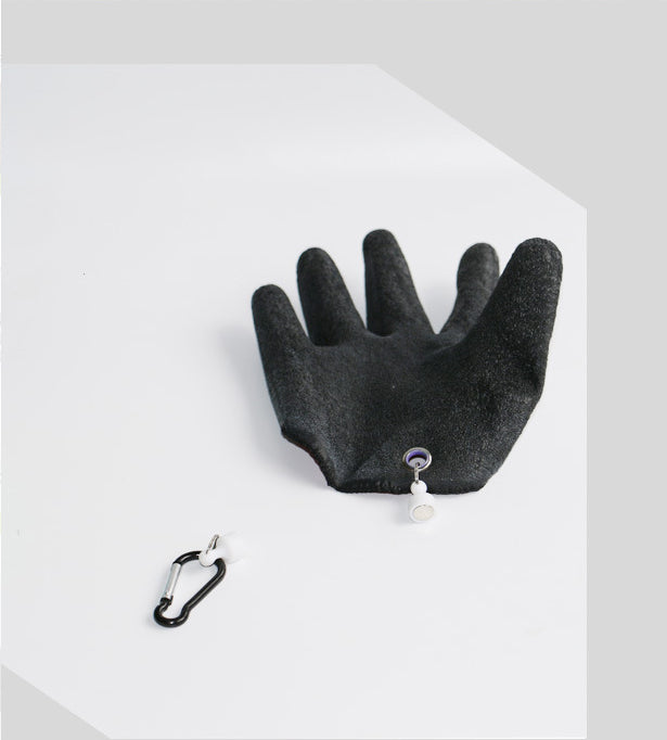 Anti-slip fishing gloves gripping a fish