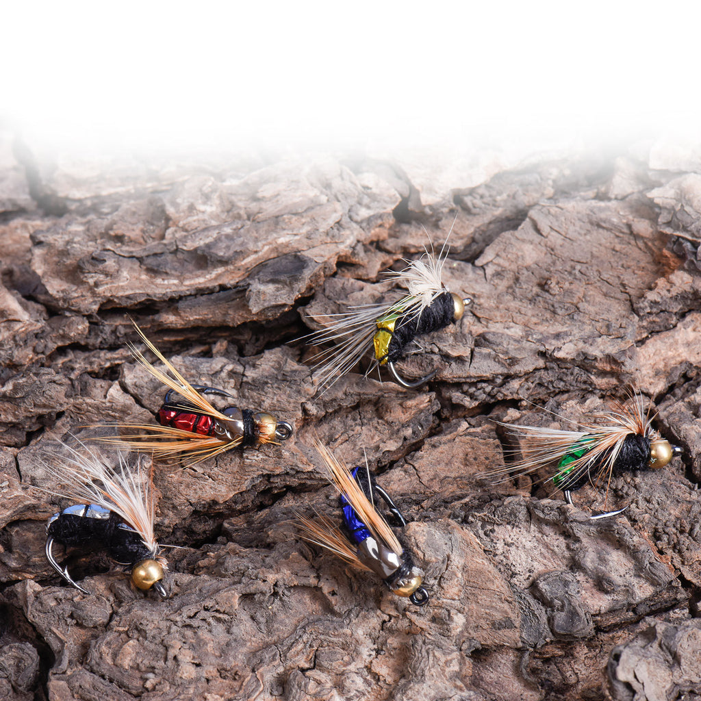 Hand-tied fly fishing lures with high-carbon steel hooks, close-up