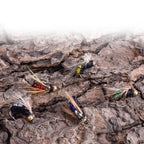 Hand-tied fly fishing lures with high-carbon steel hooks, close-up