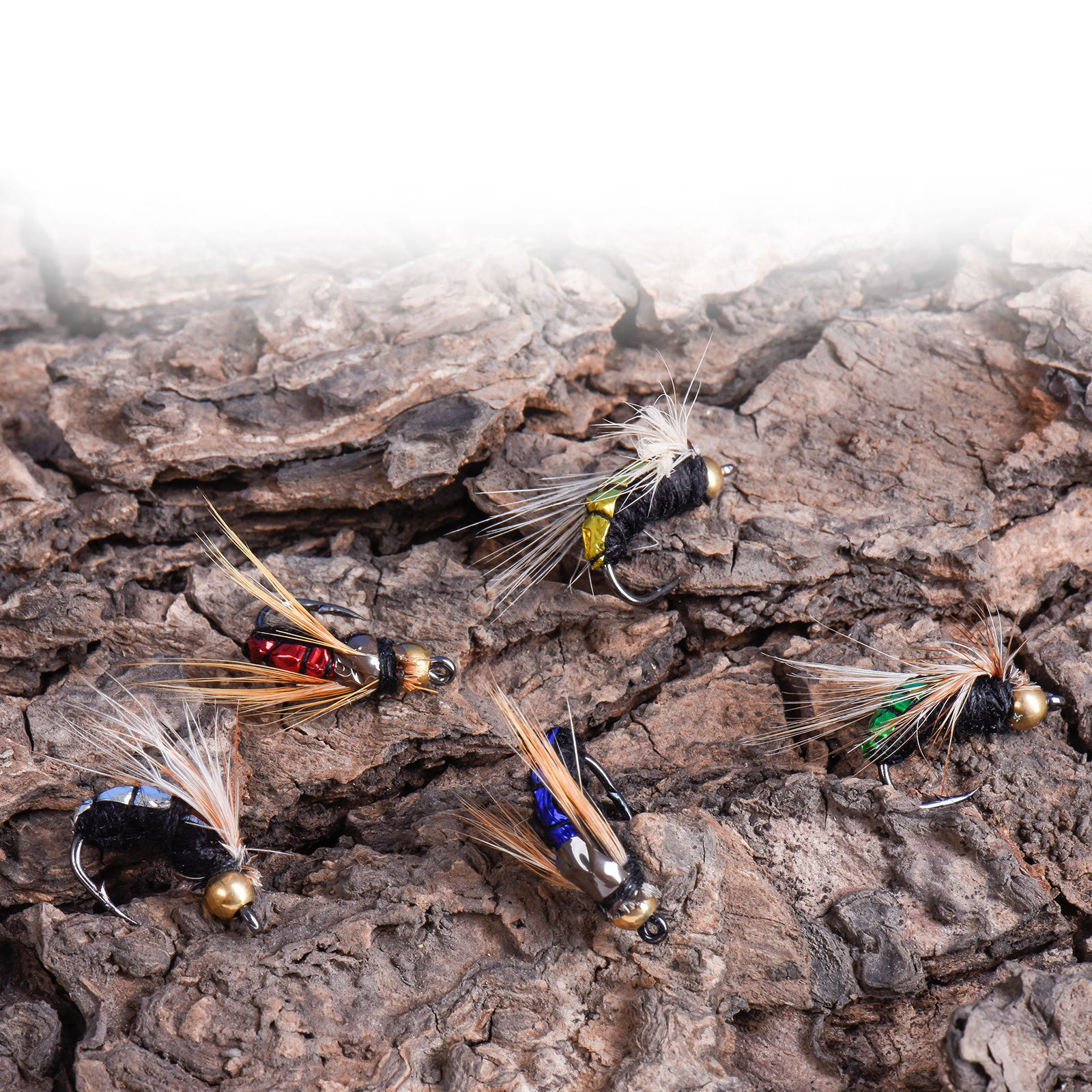 Hand-tied fly fishing lures with high-carbon steel hooks, close-up